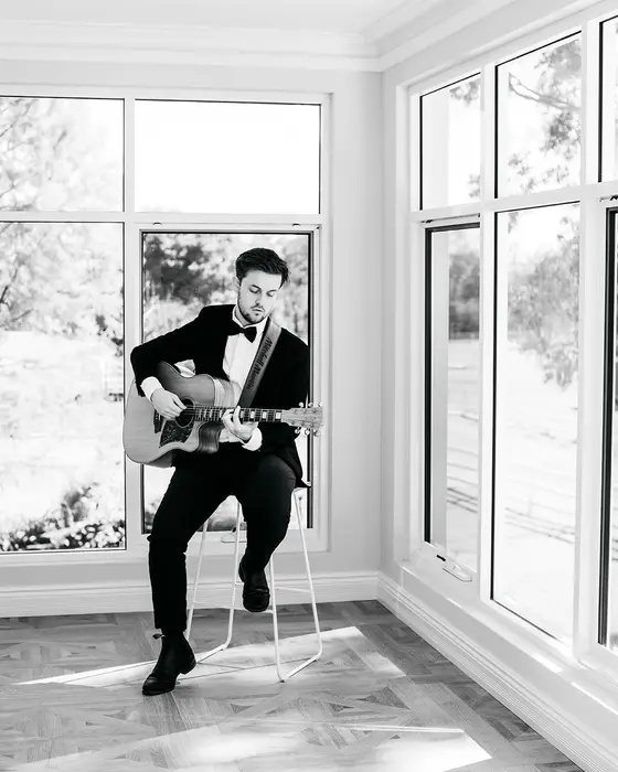 Mitchell Martin, Perth wedding singer, playing live acoustic guitar