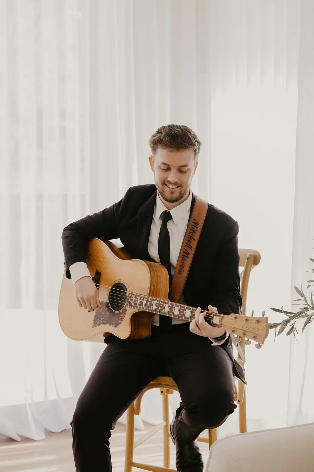 Mitchell Martin performing live acoustic guitar at a Perth wedding