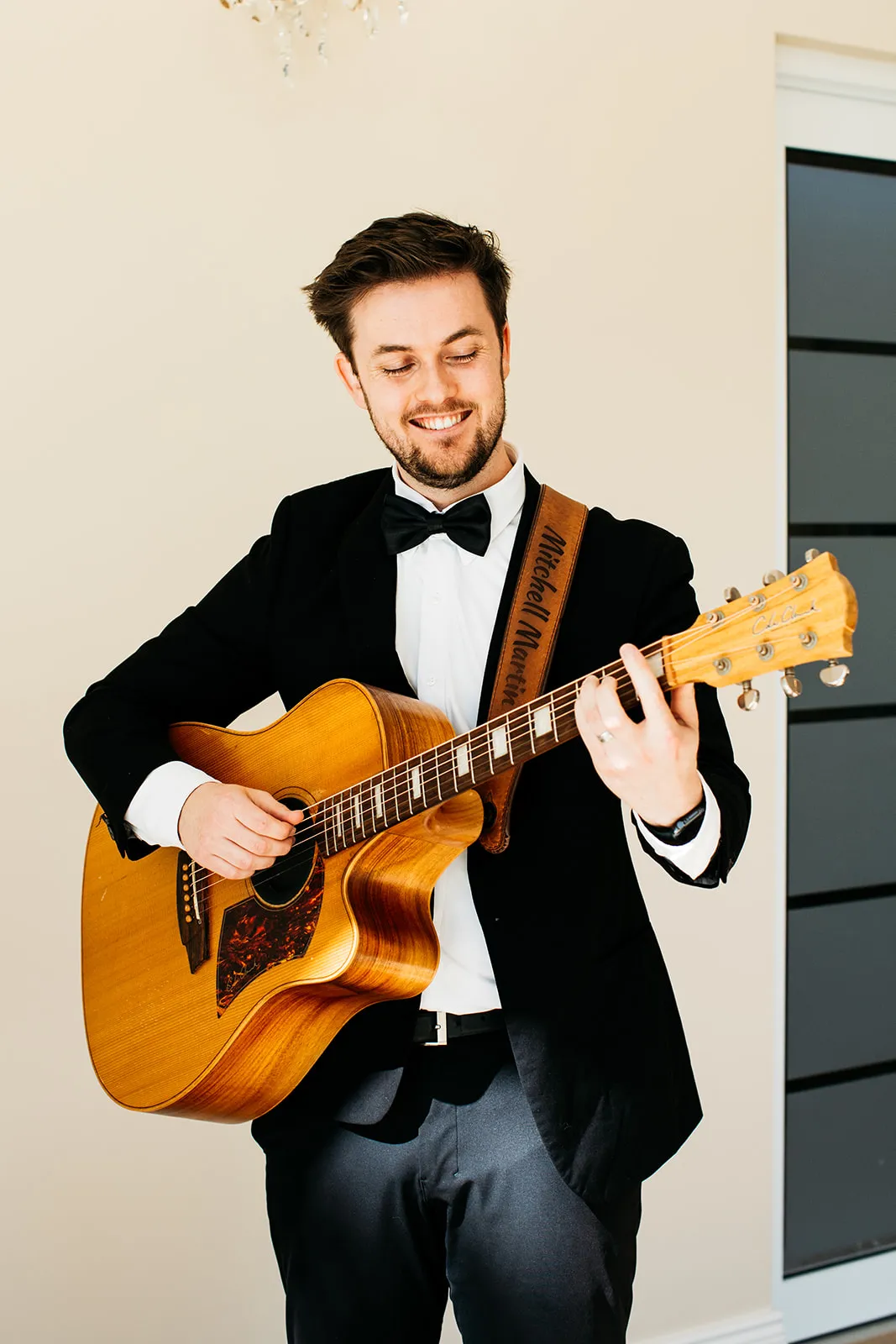 Mitchell Martin performing live acoustic guitar