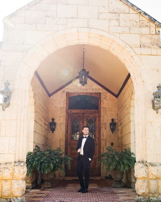 Mitchell at the entrance to a Perth wedding venue