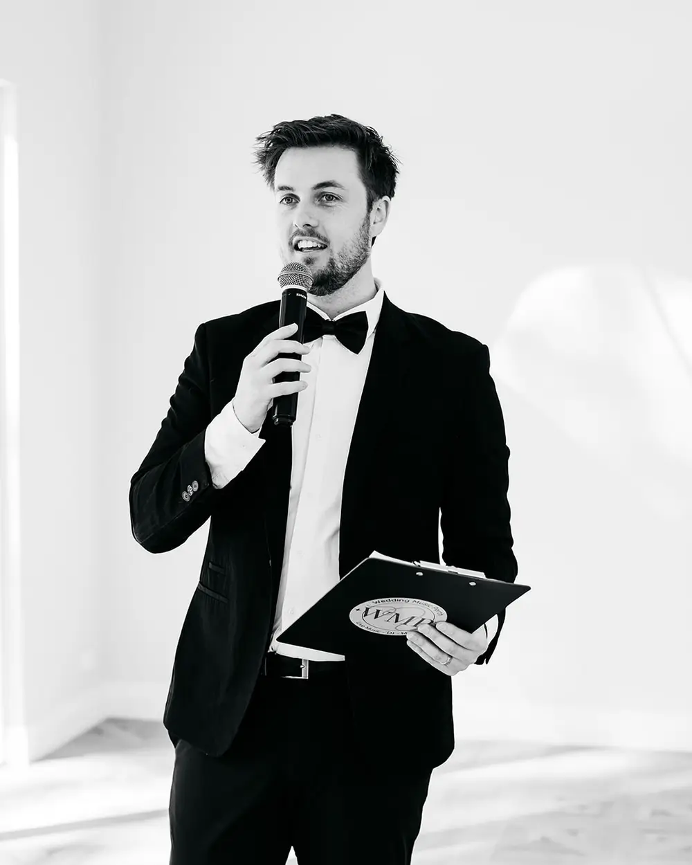 Mitchell MCing with a microphone